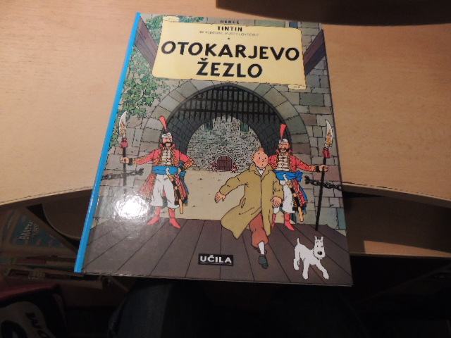 TINTIN IN NJEGOVE PUSTOLOVŠČINE OTOKARJEVO ŽEZLO HERGE UČILA INT 2004