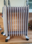 PRENOSNI ELEKTRIČNI OLJNI RADIATOR, RADIJATOR 2000W, kot nov