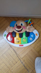 Poucni kuzek fisher price ugodno