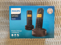 Brezžični telefon Philips D1302B z polnilno postajo in navodili