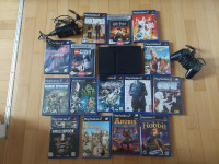 Playstation 2 + 15 iger