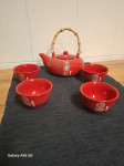 čajnik in 4 skodelice z rocno poslikavo novo