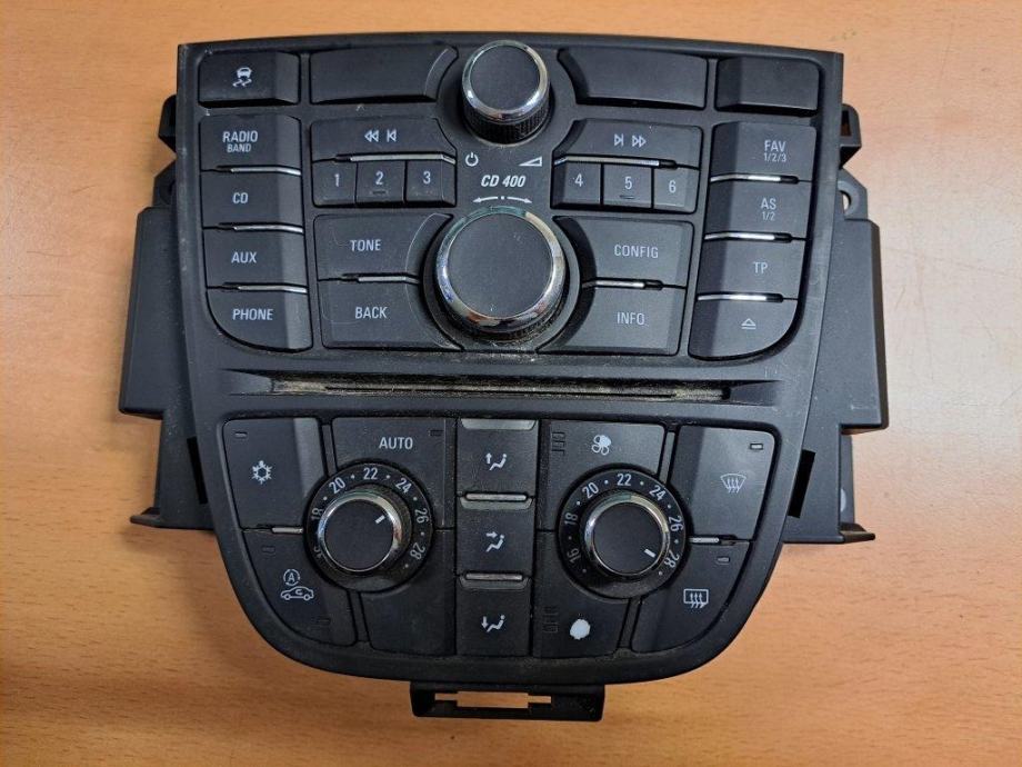 Opel Astra J klimatronic stikala ventilacije radio 13337218 13337697