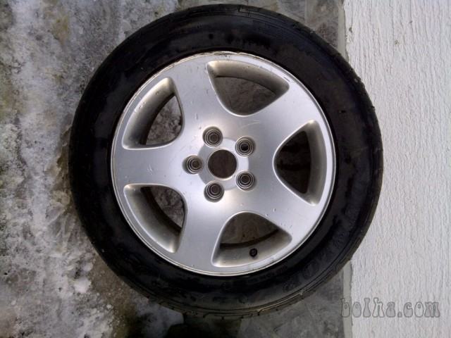 Original Audi alu platišče 16col (7Jx16 H2 ET45) z gumo Dunlop 215/...