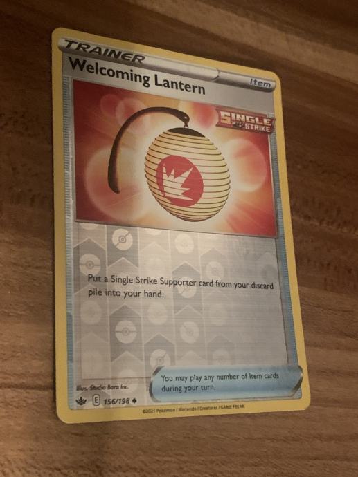 2 Pokemon kartici (Welcoming Lantern Trainer, Mime Jr. hp40)