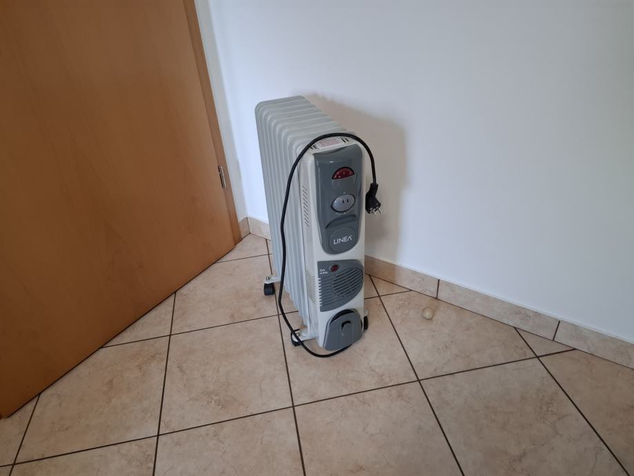 ELEKTRIČNI SOBNI RADIATOR-9 ČLENOV MALO RABLJEN,KOT NOV