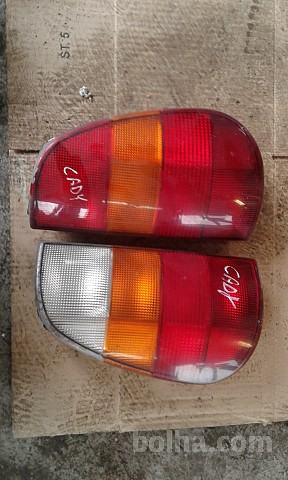 Vw Caddy zadnja luč leva desna luči žaromet 1995 do 2001